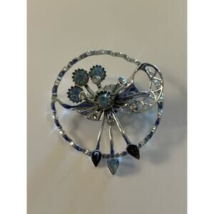 vintage or antique circular pin brooch silver colored